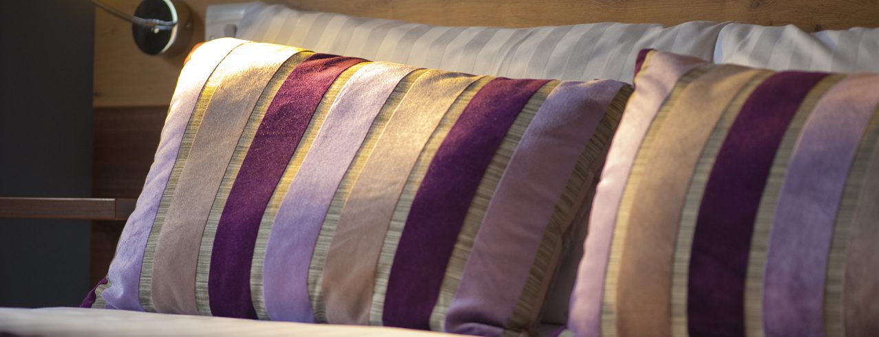 A close-up photo of Cedars Hotel bedroom pillows