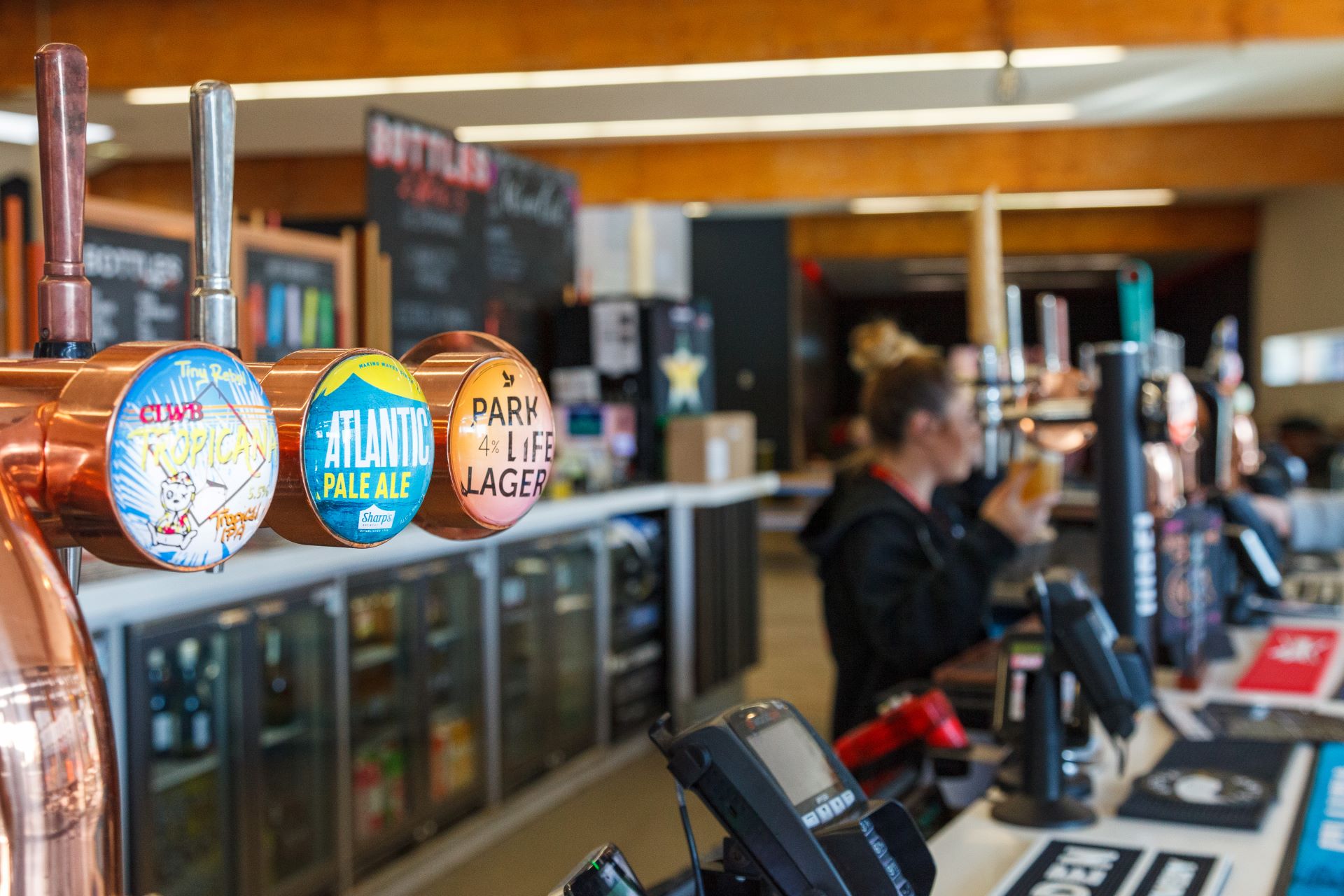 A close-up photo of Park Bar beer taps